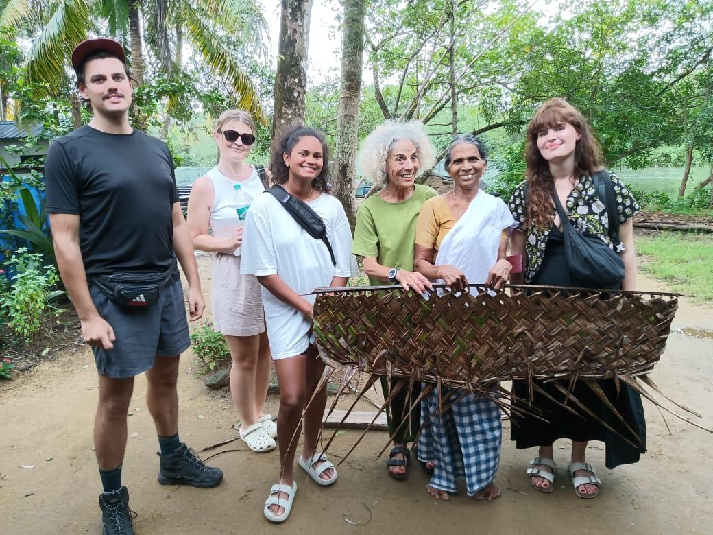 Guests discovering local weaving traditions.
