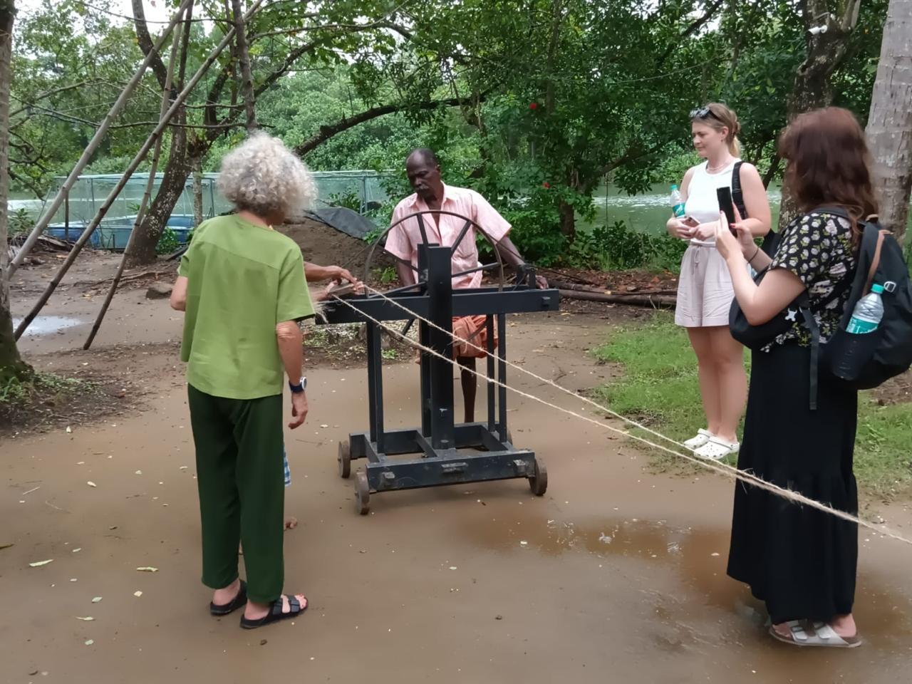 Village crafts and shared moments during the tour.